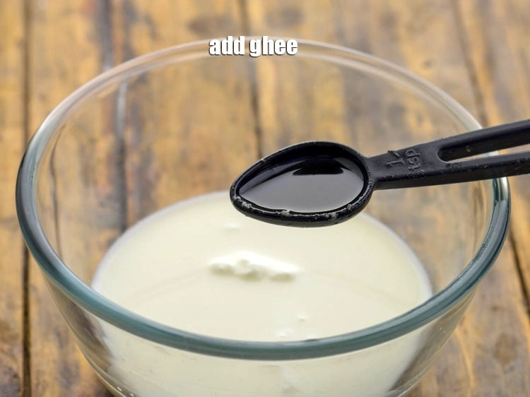 Step 4 – <p>Add the <span style="background-color:rgb(255,255,255);color:rgb(0,0,0);">1/4 tsp </span><a href="https://www.tarladalal.com/glossary-ghee-245i"><u>ghee</u></a>.</p>