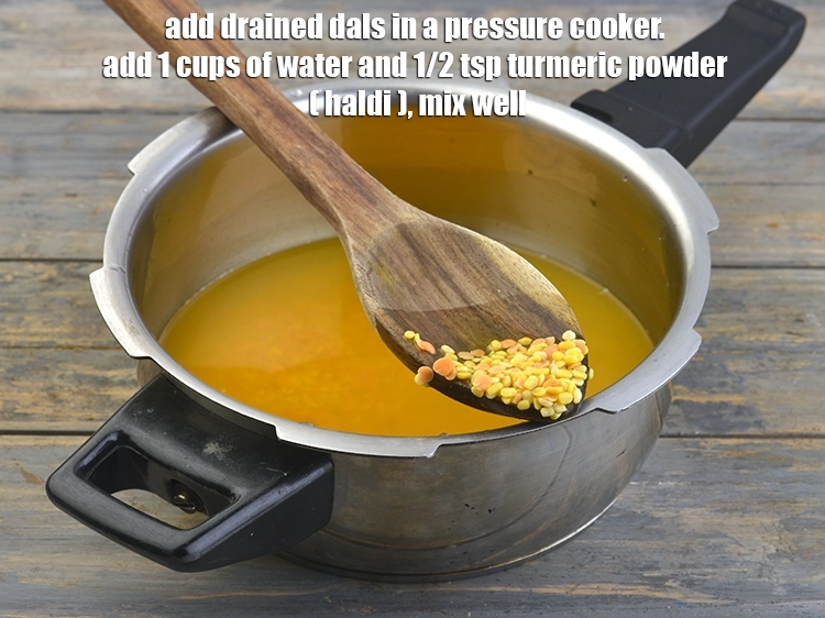 Step 8 – <p>For cooking the <strong>mixed dal</strong>, we will now pressure cook the dals so add the …