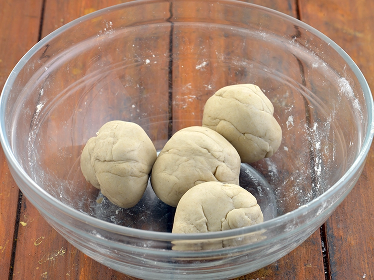 Step 37 – <p><span style="background-color:rgb(255,255,255);color:rgb(0,0,0);">Knead again using remaining oil for 1 minute. Divide the dough into 4 equal …