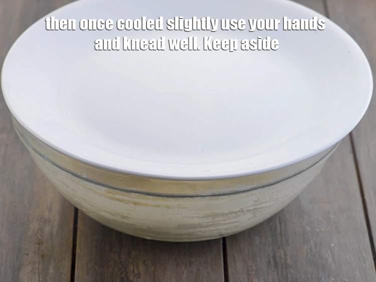 Step 7 – <p><span style="color:rgb(13,13,13);">Then once cooled slightly use your hands and knead well. Keep aside.</span></p>