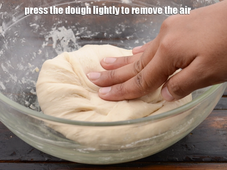 Step 12 – <p><span style="background-color:rgb(255,255,255);color:rgb(0,0,0);">Press the dough lightly to remove the air. Knead again for 1 to 2 …