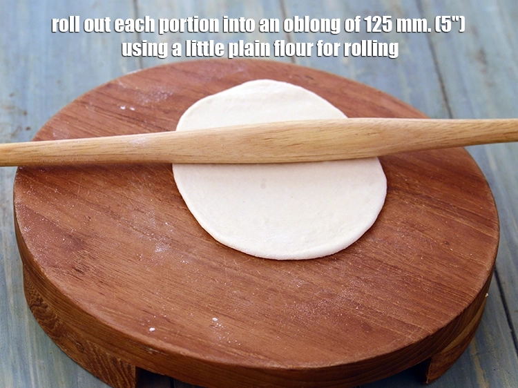 Step 14 – <p><span style="background-color:rgb(255,255,255);color:rgb(0,0,0);">Roll out each portion into an oblong of 125 mm. (5") using a little …