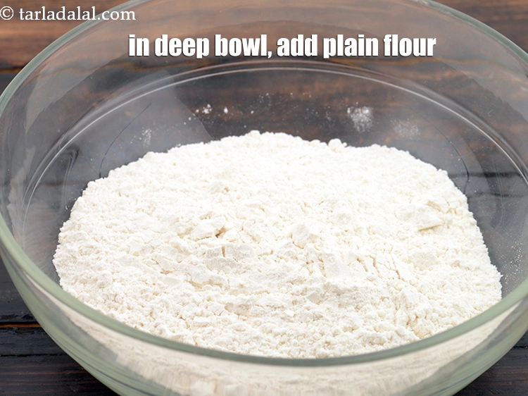 Step 7 – <p><span style="background-color:rgb(255,255,255);color:rgb(0,0,0);">In a deep bowl, add 1 cup </span><a href="https://www.tarladalal.com/glossary-plain-flour-maida-188i"><u>plain flour (maida)</u></a><u>.</u></p>
