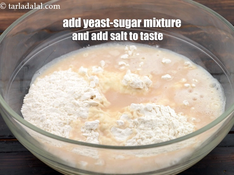 Step 8 – <p><span style="background-color:rgb(255,255,255);color:rgb(0,0,0);">Add <strong>yeast-sugar mixture</strong>. and add </span><a href="https://www.tarladalal.com/glossary-salt-namak-table-salt-418i"><u>salt </u></a><span style="background-color:rgb(255,255,255);color:rgb(0,0,0);">to taste.</span></p>