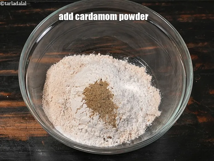 Step 8 – <p>Add 1 tsp <a href="https://www.tarladalal.com/glossary-cardamom-powder-elaichi-powder-265i">cardamom (elaichi) powder</a>.</p>
