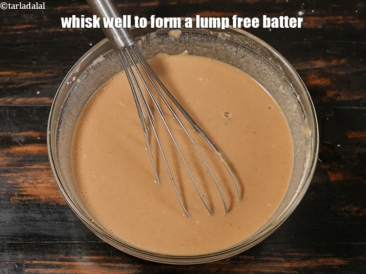 Step 11 – <p>Whisk well to form a lump free batter.</p>