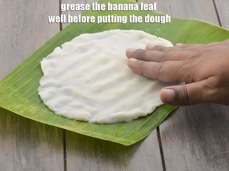 Step 19 – <p><span style="background-color:rgb(255,255,255);color:rgb(0,0,0);">Grease the banana leaf well before putting the dough.</span></p>