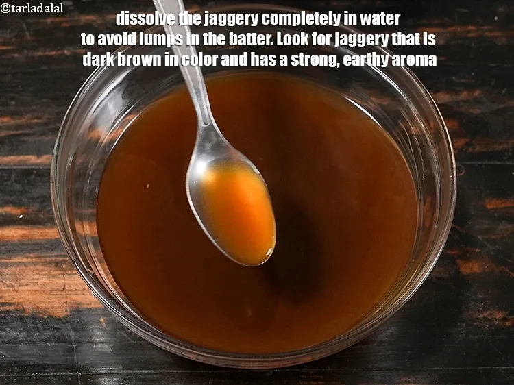 Step 20 – <p>Dissolve the jaggery completely in water to avoid lumps in the batter. Look for jaggery …