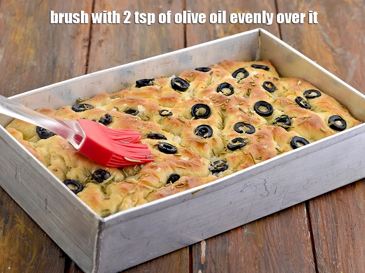 Step 11 – <p><span style="background-color:rgb(255,255,255);color:rgb(0,0,0);">Brush with 2 tsp of </span><a href="https://www.tarladalal.com/glossary-olive-oil-451i"><u>olive oil</u></a><span style="background-color:rgb(255,255,255);color:rgb(0,0,0);"> evenly over it.</span></p>