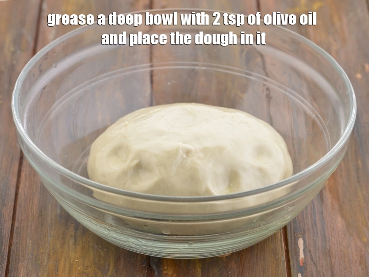 Step 4 – <p><span style="background-color:rgb(255,255,255);color:rgb(0,0,0);">Grease a deep bowl with 2 tsp of </span><a href="https://www.tarladalal.com/glossary-olive-oil-451i"><u>olive oil</u></a><span style="background-color:rgb(255,255,255);color:rgb(0,0,0);"> and place …