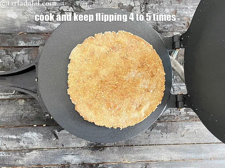 Step 44 – <html><head><meta charset="UTF-8"></head><body><p>Cook and keep flipping 4 to 5 times. Or else the&nbsp;<strong>khakhra</strong>&nbsp;will get burnt and …