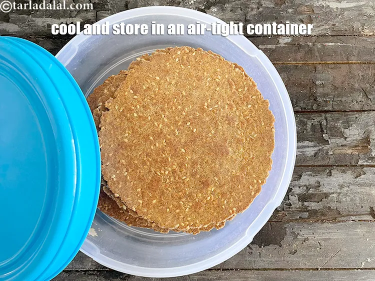 Step 46 – <html><head><meta charset="UTF-8"> </head><body><p>Cool and store the <strong>nachni sesame khakhra made with khakhra press</strong>&nbsp;in an air-tight …