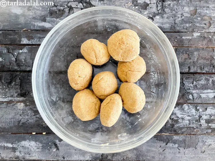 Step 23 – <p>Divide dough into 8 pieces. Shape into round balls.</p>