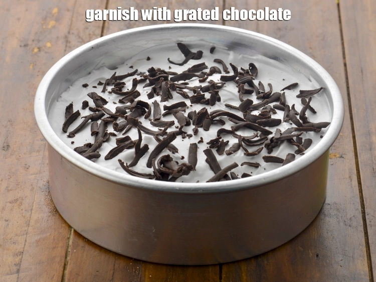 Step 13 – <p><span style="background-color:rgb(255,255,255);color:rgb(0,0,0);">Garnish with 2 tbsp </span><a href="https://www.tarladalal.com/glossary-milk-chocolate-328i#ing_3381"><u>grated milk chocolate</u></a><span style="background-color:rgb(255,255,255);color:rgb(0,0,0);">.</span></p>