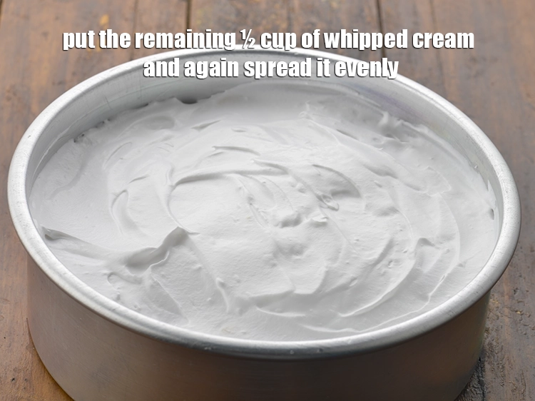 Step 11 – <p><span style="background-color:rgb(255,255,255);color:rgb(0,0,0);">Put the remaining ½ cup of </span><a href="https://www.tarladalal.com/glossary-beaten-whipped-cream-1948i"><u>beaten whipped cream</u></a><span style="background-color:rgb(255,255,255);color:rgb(0,0,0);"> and again spread …