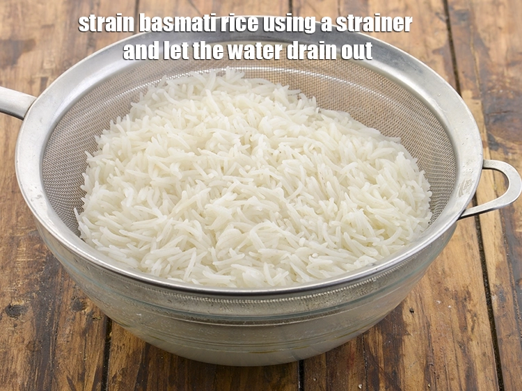Step 11 – <p>Strain <strong>basmati rice</strong> using a strainer and let the water drain out. This will give …