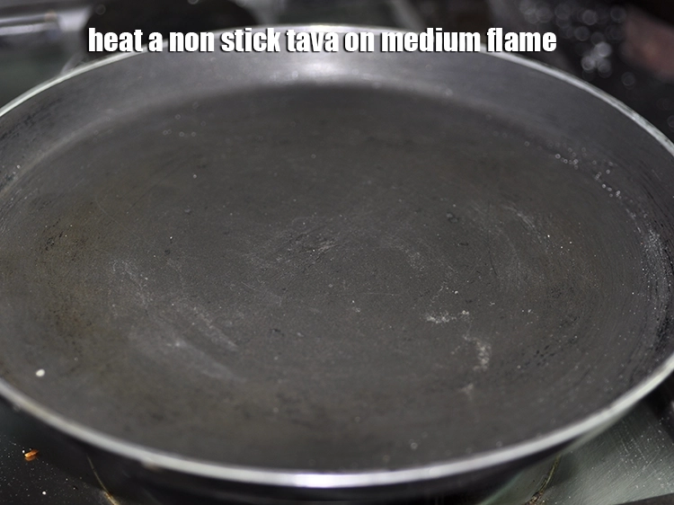 Step 13 – <p>Heat a non stick tava on medium flame.</p>