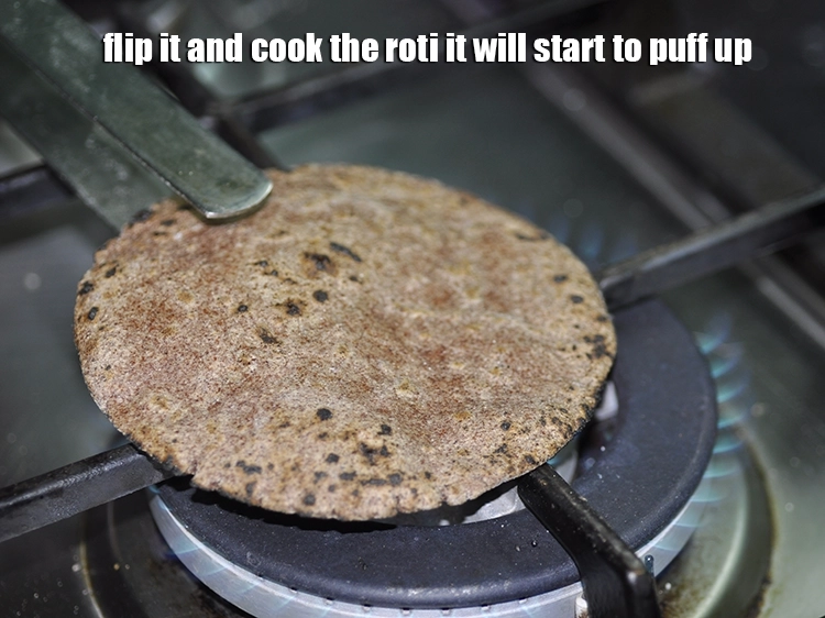 Step 17 – <p>Flip it and cook the&nbsp;<strong>plain ragi roti recipe | soft ragi roti &nbsp;| plain nachni …
