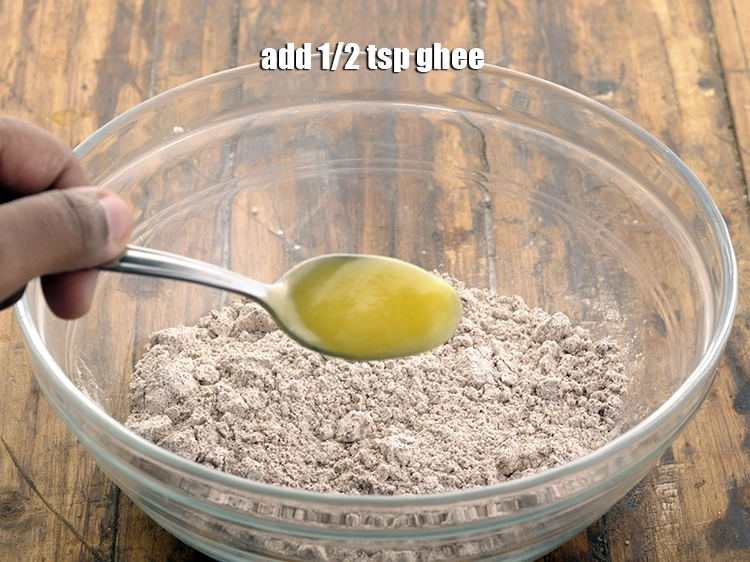 Step 5 – <p>Add <span style="background-color:rgb(255,255,255);color:rgb(0,0,0);">1/2 tsp </span><a href="https://www.tarladalal.com/glossary-ghee-245i"><u>ghee</u></a>. Ghee will provide a softness to the dough as …