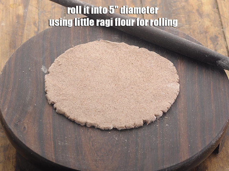 Step 12 – <p>Roll it into 5" diameter using little <a href="https://www.tarladalal.com/glossary-ragi-flour-nachni-flour-nachni-ka-atta-red-millet-flour-1115i"><u>ragi (nachni , red millet) flour</u></a> for …
