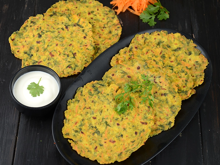 Step 26 – <html><head><meta charset="UTF-8"> </head><body><p>Serve&nbsp;<strong>carrot coriander roti&nbsp;</strong>with curds.&nbsp;See&nbsp;<a href="https://www.tarladalal.com/how-to-make-curd-or-dahi-at-home-2790r">how to make curds</a>.&nbsp;</p></body></html>