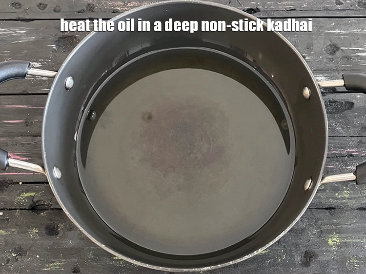 Step 8 – <p><span style="background-color:rgb(255,255,255);color:rgb(0,0,0);">Heat the </span><a href="https://www.tarladalal.com/glossary-oil-671i"><u>oil</u></a><span style="background-color:rgb(255,255,255);color:rgb(0,0,0);"> in a deep non-stick kadhai.</span></p>