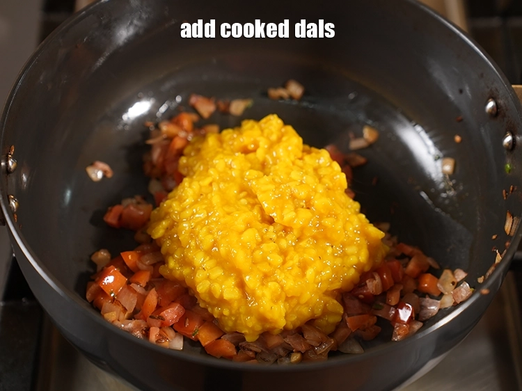 Step 18 – <p>Add the <strong>cooked dals</strong>.</p>