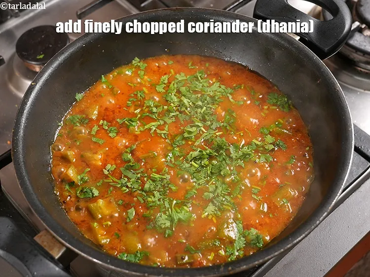Step 24 – <p>Add&nbsp;2 tbsp&nbsp;finely&nbsp;<a href="https://www.tarladalal.com/glossary-chopped-coriander-783i">chopped coriander (dhania)</a>.</p>