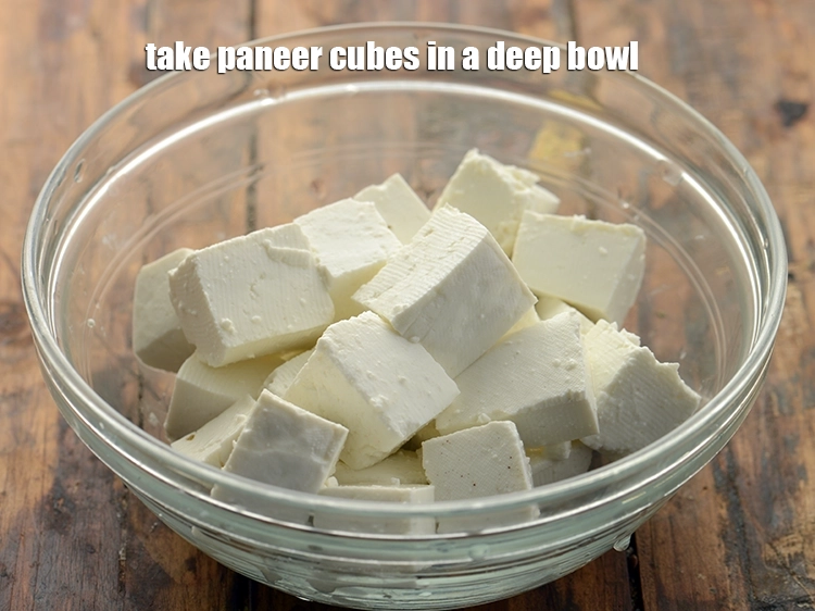 Step 2 – <p><span style="background-color:rgb(255,255,255);color:rgb(0,0,0);">Take </span><a href="https://www.tarladalal.com/glossary-paneer-cottage-cheese-chenna-985i#ing_3095"><u>paneer (cottage cheese) cubes</u></a><span style="background-color:rgb(255,255,255);color:rgb(0,0,0);"> in a deep bowl.</span></p>