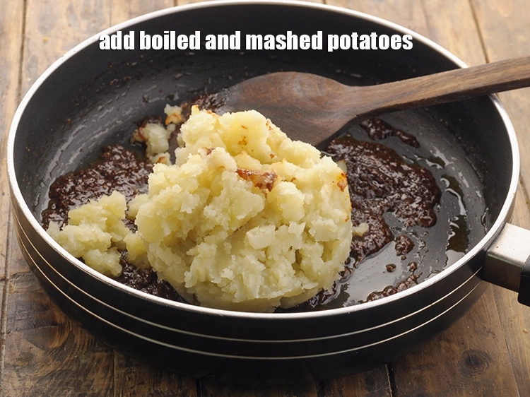 Step 10 – <p>Add the <span style="background-color:rgb(255,255,255);color:rgb(0,0,0);">1 1/4 cups boiled , peeled and </span><a href="https://www.tarladalal.com/glossary-potatoes-aloo-alu-batata-710i#ing_2516"><u>boiled and mashed potatoes</u></a>.</p>