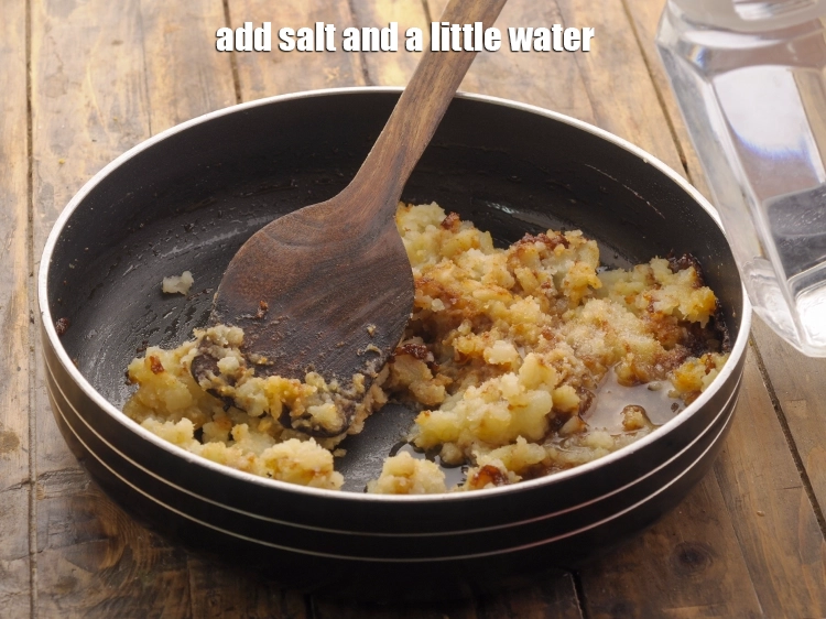 Step 11 – <p>Add the <a href="https://www.tarladalal.com/glossary-salt-namak-table-salt-418i"><u>salt </u></a><span style="background-color:rgb(255,255,255);color:rgb(0,0,0);">to taste</span> and a little <strong>water</strong>.</p>