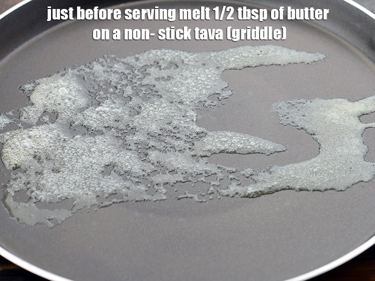 Step 39 – <p>Just before serving melt 1/2 tbsp of <a href="https://www.tarladalal.com/glossary-butter-makhan-233i"><u>butter</u></a> on a non- stick tava (griddle).</p>