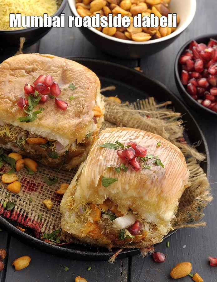 Step 47 – <p><span style="background-color:rgb(255,255,255);color:rgb(0,0,0);">Serve the </span><strong>Mumbai roadside dabeli</strong><span style="background-color:rgb(255,255,255);color:rgb(0,0,0);"> immediately.</span></p>