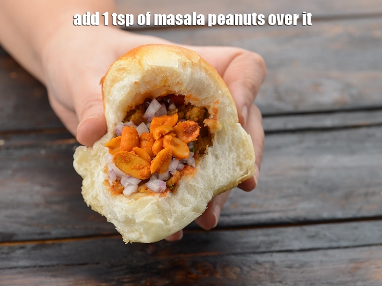 Step 35 – <p>Add 1 tsp of <a href="https://www.tarladalal.com/glossary-masala-peanuts-masala-sing-spicy-peanuts-1188i"><u>masala peanuts</u></a> over it.</p>