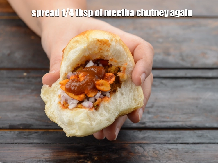Step 36 – <p>Spread 1/4 tbsp of <a href="https://www.tarladalal.com/khajur-imli-ki-chutney-sweet-tamarind-chutney-2796r"><u>sweet chutney</u></a> again.&nbsp;</p>
