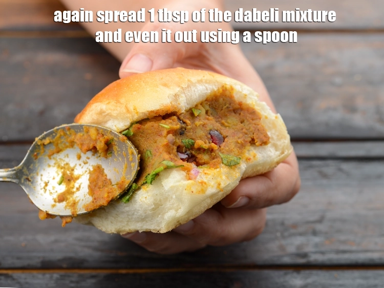 Step 37 – <p>Again spread 1 tbsp of the <strong>dabeli mixture</strong> and even it out using a spoon.</p>