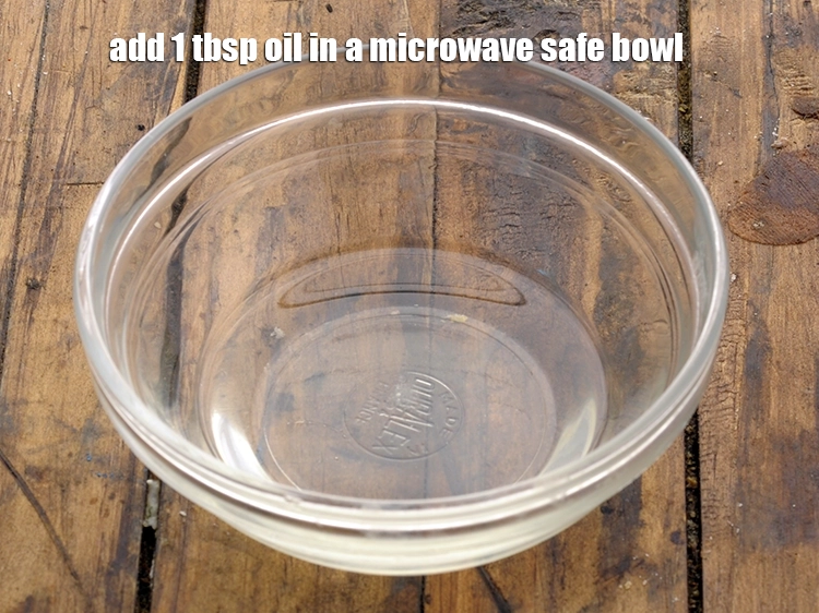 Step 5 – <p><span style="background-color:rgb(255,255,255);color:rgb(0,0,0);">Add the 1 tbsp </span><a href="https://www.tarladalal.com/glossary-oil-671i"><u>oil</u></a><span style="background-color:rgb(255,255,255);color:rgb(0,0,0);"> in a microwave safe bowl.</span></p>