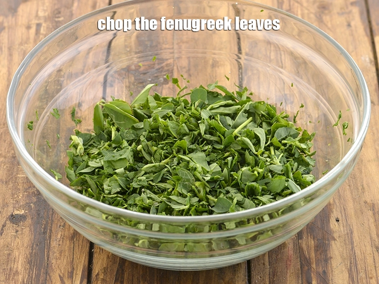 Step 10 – <p><span style="background-color:rgb(255,255,255);color:rgb(0,0,0);">Chop the </span><a href="https://www.tarladalal.com/glossary-fenugreek-leaves-methi-methi-leaves-methi-ke-patte-methi-ki-bhaji-373i#ing_2382"><u>fenugreek leaves (methi) </u></a><span style="background-color:rgb(255,255,255);color:rgb(0,0,0);">leaves.</span></p>