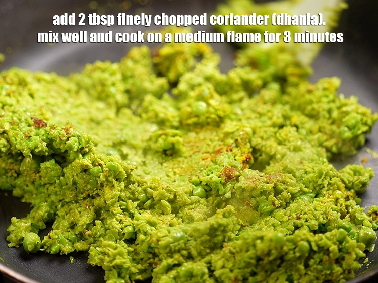 Step 18 – <p>Add <span style="background-color:rgb(255,255,255);color:rgb(0,0,0);">2 tbsp finely </span><a href="https://www.tarladalal.com/glossary-coriander-dhania-kothmir-369i#ing_2365"><u>chopped coriander (dhania)</u></a><u>. </u><span style="background-color:rgb(255,255,255);color:rgb(0,0,0);">mix well and cook on …
