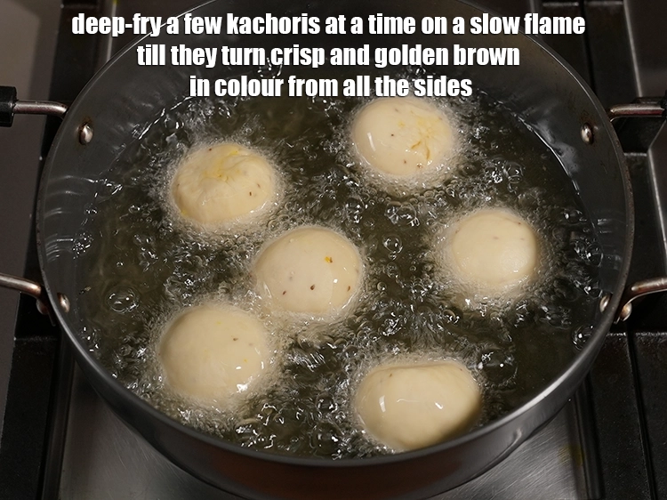 Step 25 – <p><span style="background-color:rgb(255,255,255);color:rgb(0,0,0);">Heat the </span><a href="https://www.tarladalal.com/glossary-oil-671i"><u>oil</u></a><span style="background-color:rgb(255,255,255);color:rgb(0,0,0);"> in a deep non-stick kadhai and deep-fry a few …