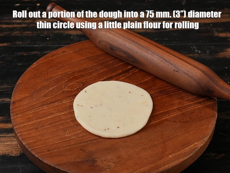 Step 21 – <p><span style="background-color:rgb(255,255,255);color:rgb(0,0,0);">Roll out a portion of the dough into a 75 mm. (3”) diameter thin …