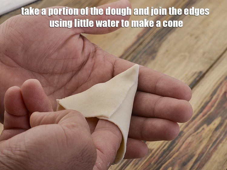 Step 10 – <p><span style="background-color:rgb(255,255,255);color:rgb(0,0,0);">Take a portion of the dough and join the edges using little water to …