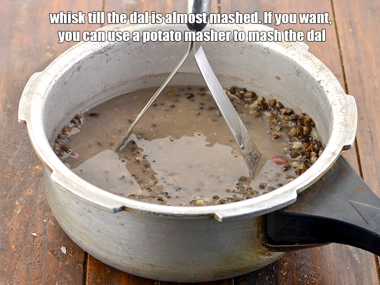 Step 11 – <p>Whisk till the dal is almost mashed. If you want, you can use a potato …