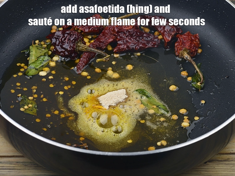 Step 3 – <p>Add <span style="background-color:rgb(255,255,255);color:rgb(0,0,0);">1/2 tsp </span><a href="https://www.tarladalal.com/glossary-asafoetida-hing-113i"><u>asafoetida (hing)</u></a><span style="background-color:rgb(255,255,255);color:rgb(0,0,0);"> and sauté on a medium flame for …