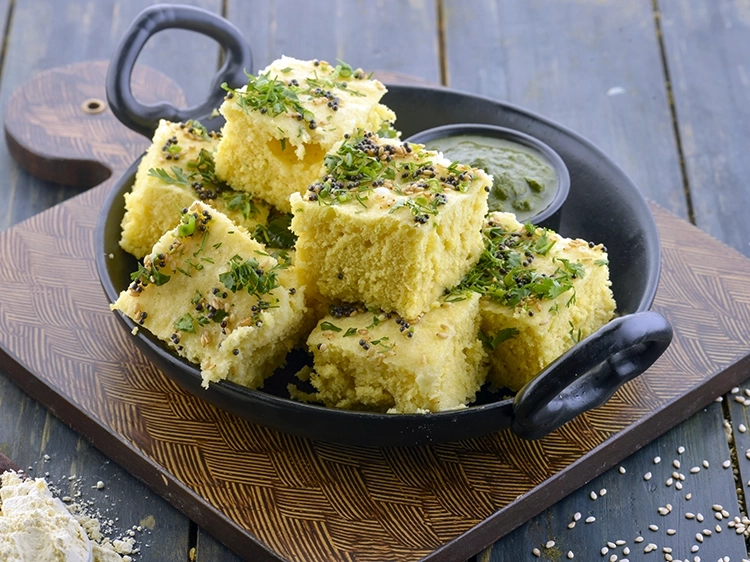 Step 27 – <p>What are Dhoklas? Dhokla is a soft and fluffy steamed snack from the Gujarati repertoire. …