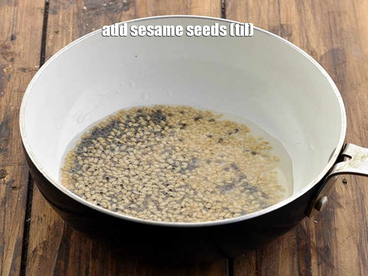 Step 18 – <p>When the seeds crackle, add the <span style="background-color:rgb(255,255,255);color:rgb(0,0,0);">1 tsp </span><a href="https://www.tarladalal.com/glossary-sesame-seeds-til-gingelly-seeds-612i"><u>sesame seeds (til)</u></a> to the …