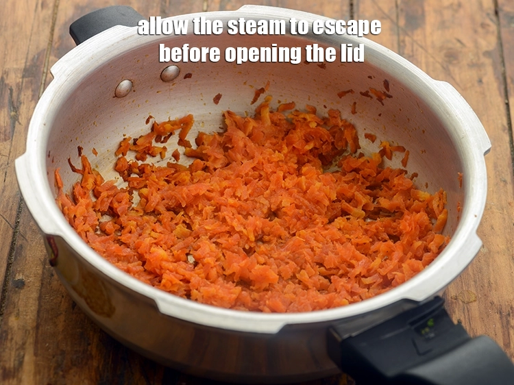 Step 10 – <p>Allow the steam to escape before opening the lid. Pressure-cooking helps in cooking the carrots …