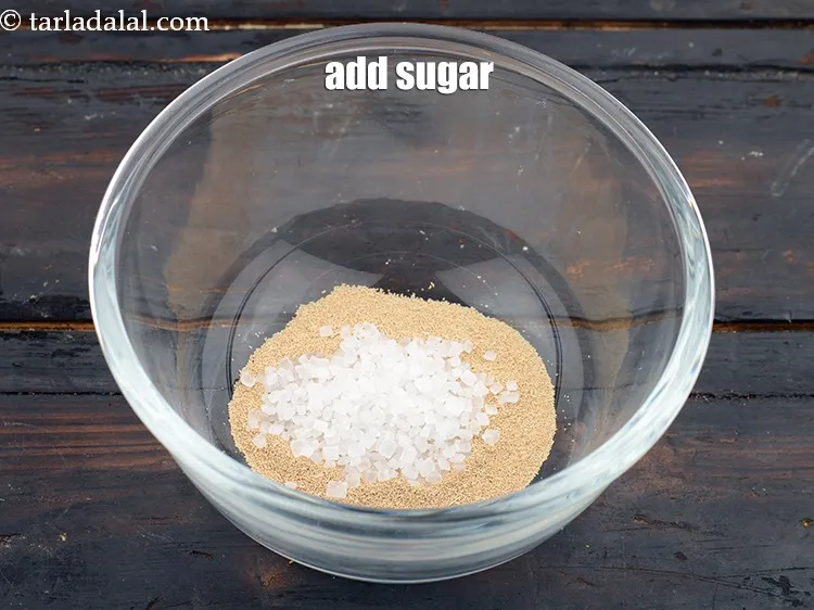 Step 2 – <p><span style="background-color:rgb(255,255,255);color:rgb(0,0,0);">Add 2 tsp </span><a href="https://www.tarladalal.com/glossary-sugar-chini-shakkar-278i"><u>sugar</u></a>.</p>