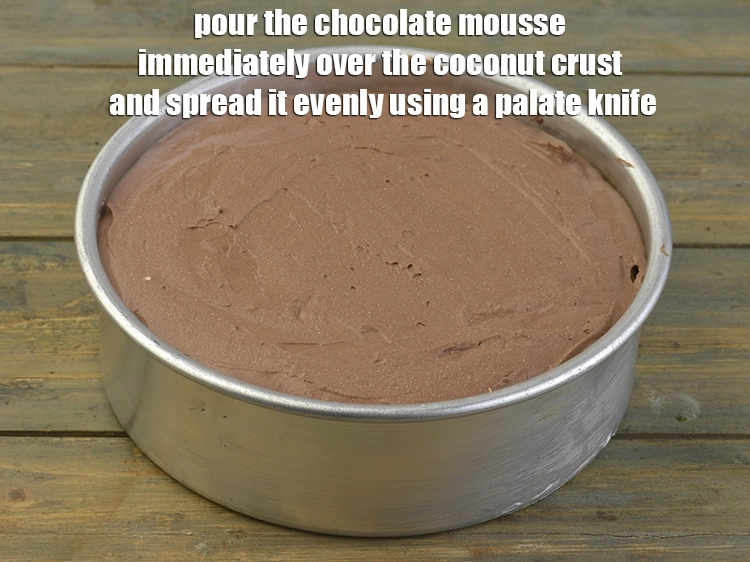 Step 11 – <p><span style="background-color:rgb(255,255,255);color:rgb(0,0,0);">Pour the <strong>chocolate mousse</strong> immediately over the <strong>coconut crust</strong> and spread it evenly using …