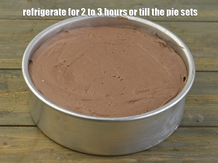 Step 12 – <p><span style="background-color:rgb(255,255,255);color:rgb(0,0,0);">Refrigerate for 2 to 3 hours or till the <strong>Chocolate Chiffon Pie</strong> sets.</span></p>